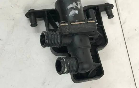Coolant heater control valve