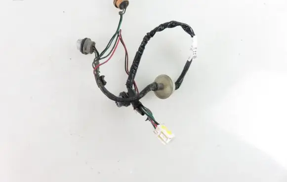 Mazda 5 Tail light bulb cover holder