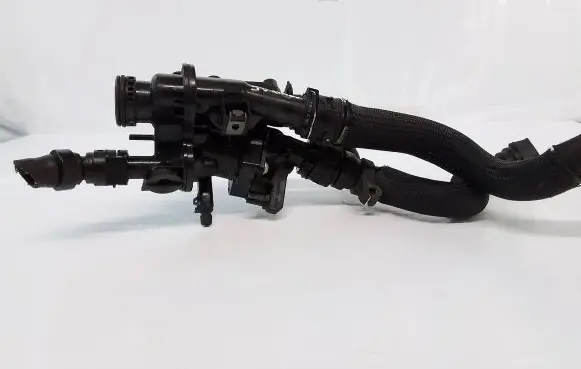 Thermostat/thermostat housing