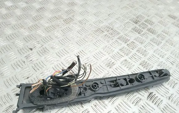 Tail light bulb cover holder
