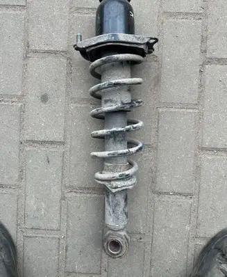 Toyota Prius (NHW20) Rear shock absorber with coil spring 485304705 4853047051