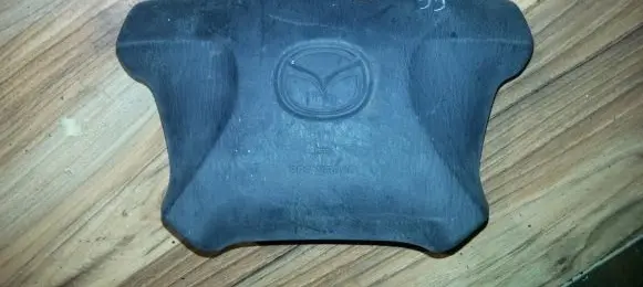 Mazda 323 Steering wheel airbag T93059A