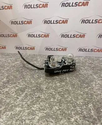 Tail light bulb cover holder