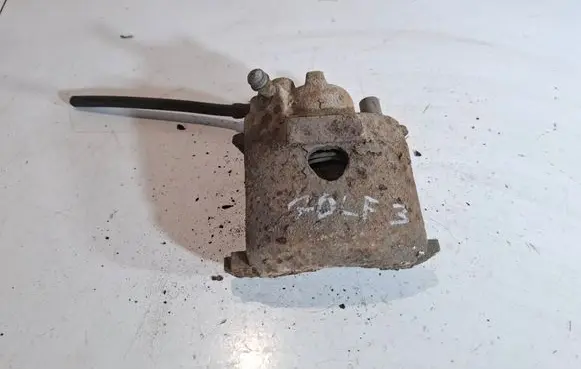 Volkswagen Golf III Front brake caliper