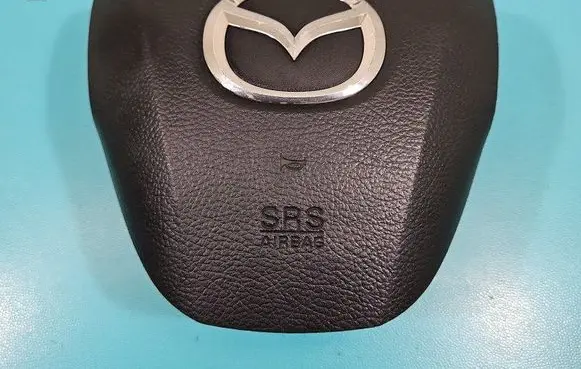Steering wheel airbag