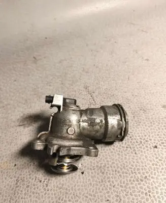 Thermostat/thermostat housing