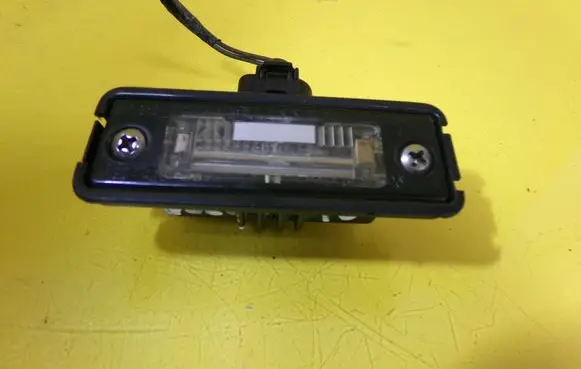 Volkswagen Golf IV Number plate light 1J6943021