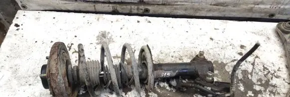 Nissan Primera Front shock absorber with coil spring