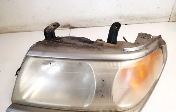 Mitsubishi Pajero Sport I Headlight/headlamp 10087415 100-87415