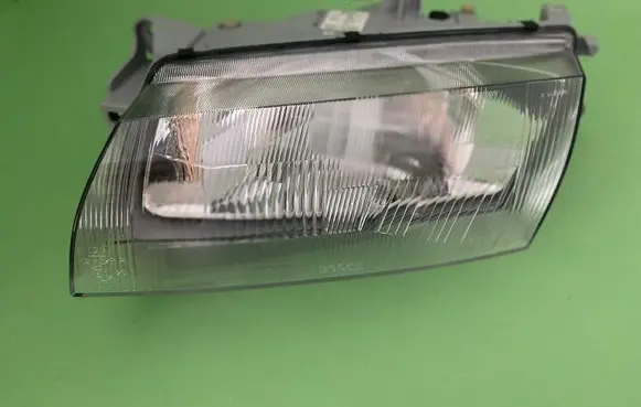 Mazda 323 Headlight/headlamp BG2L51040C