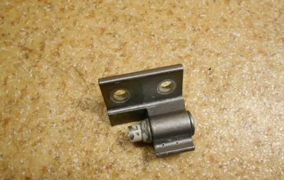 Rear door upper hinge