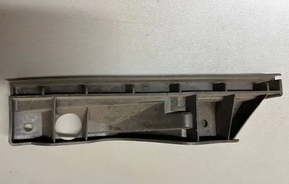 Volkswagen Touran I Front bumper mounting bracket 1T0807890A
