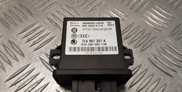 Volkswagen Touareg I Light module LCM 7L6907357A 5WK49171A