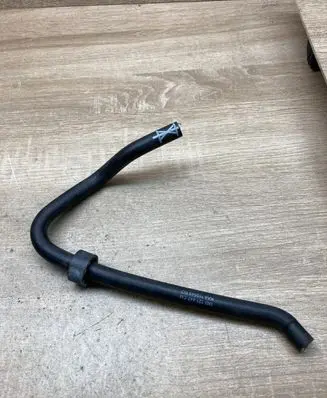 Volkswagen Touran I Engine coolant pipe/hose 1K0121447CM
