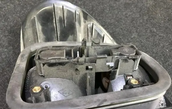 Renault Laguna I Tail light bulb cover holder