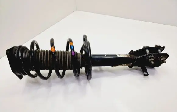 Peugeot 2008 II Front shock absorber with coil spring 9836654880 ST32000794