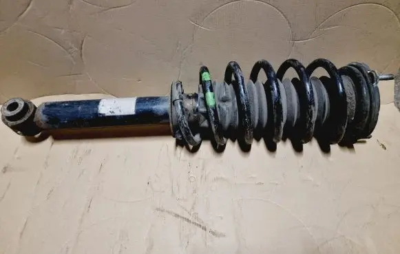 Front shock absorber with coil spring