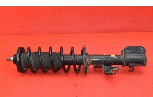 Nissan Micra C+C Front shock absorber/damper 543035FA0D