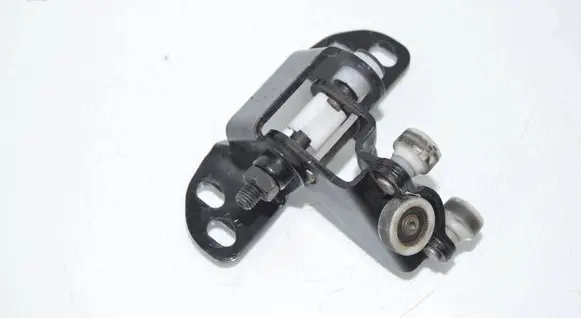 Volkswagen Crafter Sliding door upper roller guide/hinge 7C0843304
