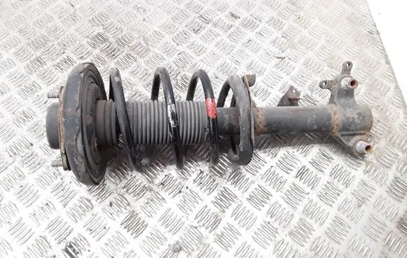 Nissan Primera Front shock absorber with coil spring