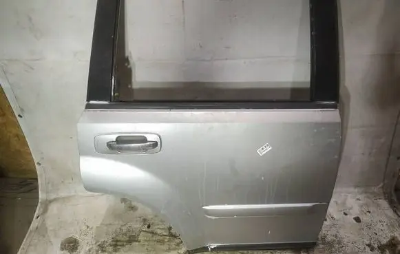 Nissan X-Trail T30 Rear door pilkos