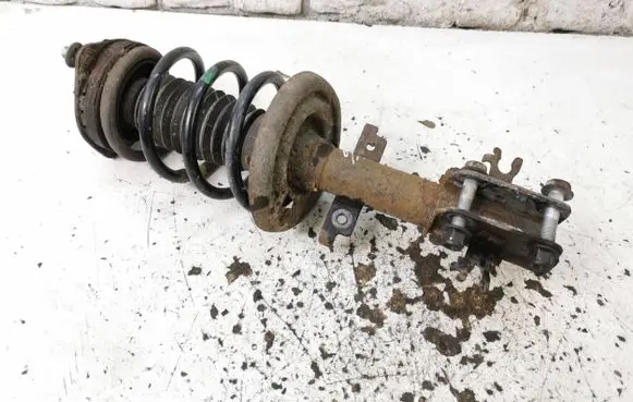 Renault Laguna III Front shock absorber with coil spring