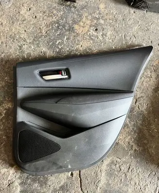 Toyota Corolla E210 E21 Front door card panel trim braknumeruczci