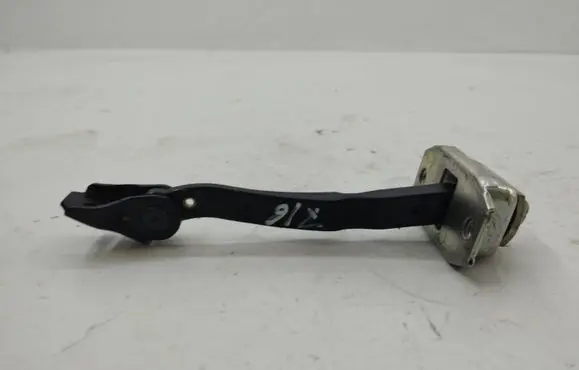 Front door check strap stopper