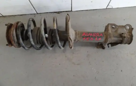 Nissan Almera N16 Front shock absorber with coil spring