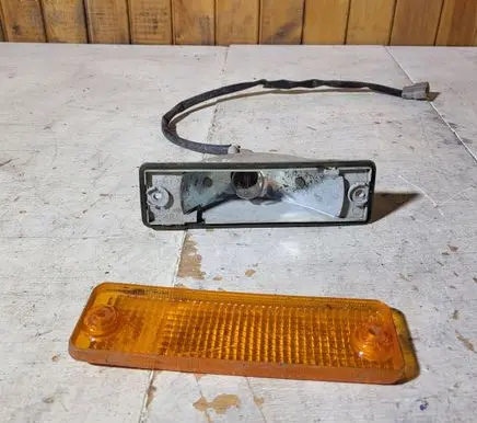 Mazda 626 Front bumper turn signal 0450535