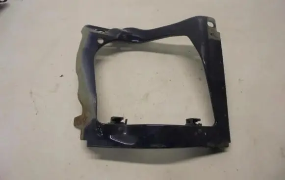 Engine bonnet/hood lock trim molding