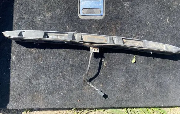 BMW 5 E39 Trunk door license plate light bar 0461700