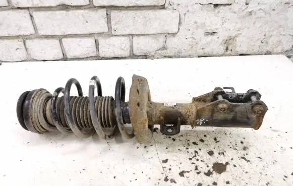 Front shock absorber with coil spring