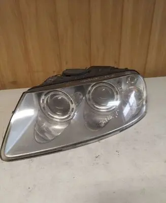 Volkswagen Touareg I Headlight/headlamp 7L6941015CF 89307851