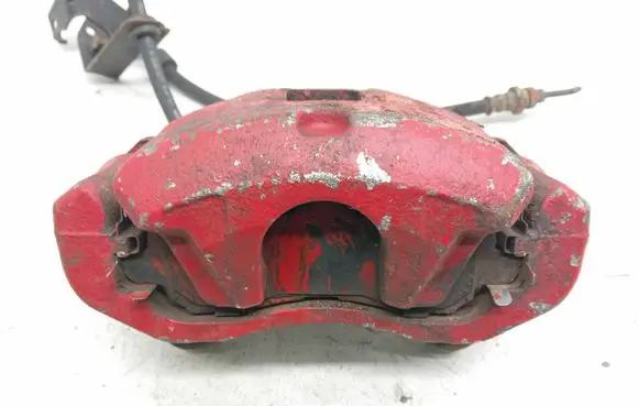 Mitsubishi Lancer VIII Front brake caliper