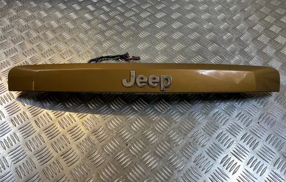 Trunk door license plate light bar