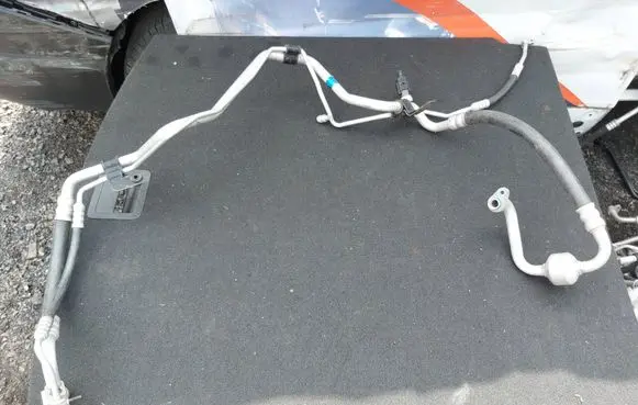 KIA Sportage Air conditioning (A/C) pipe/hose 977753U000