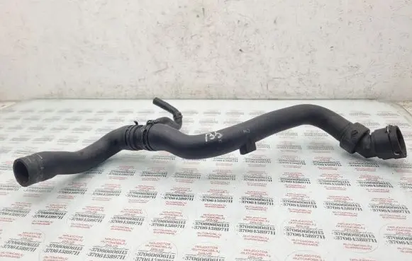 Volkswagen PASSAT B5 Engine coolant pipe/hose 8D0121101AJ