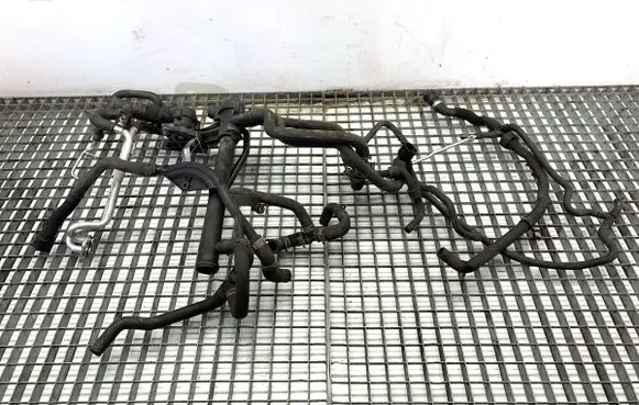 Volkswagen Jetta VI Engine coolant pipe/hose 1K0121058BC