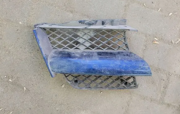 Mitsubishi Outlander Front bumper upper radiator grill MR971688