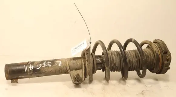 Volkswagen Caddy Front shock absorber with coil spring 