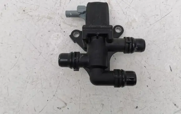 Coolant heater control valve