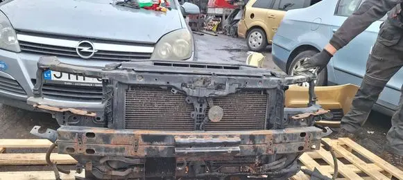Radiator support slam panel