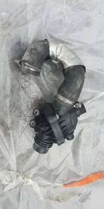 Thermostat/thermostat housing