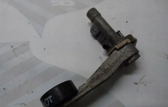 Peugeot 207 CC Generator/alternator belt tensioner 7570158009