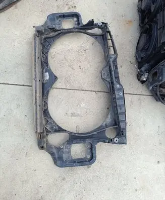 Radiator support slam panel bracket
