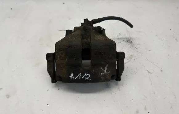 Volkswagen PASSAT B7 Front brake caliper