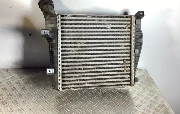 Volkswagen Touareg II Intercooler radiator 7P0145804B 7L0117030