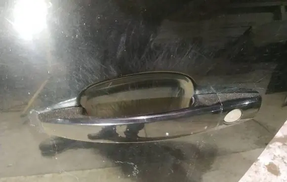 Opel Zafira B Front door exterior handle 