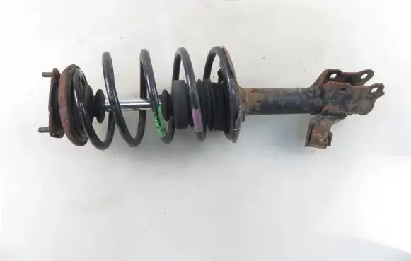 Nissan Almera N16 Front shock absorber with coil spring